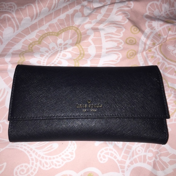 kate spade Handbags - KATE SPADE Saffiano Leather Trifold Phone wallet